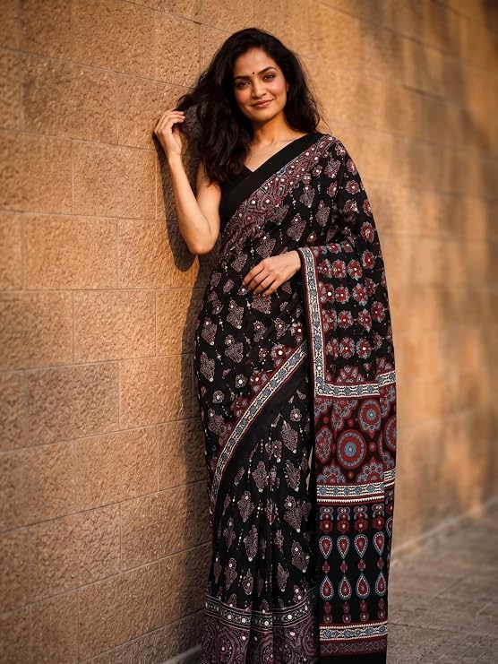 Orbexa Ajrakh Modal Silk Saree for Women | Mirror Work Black Saree | Gajji Silk Red Pallu Tassels | Designer Sarees for Women Party | Ajrakh Print Saree | Modal Silk Sarees Original (Black)