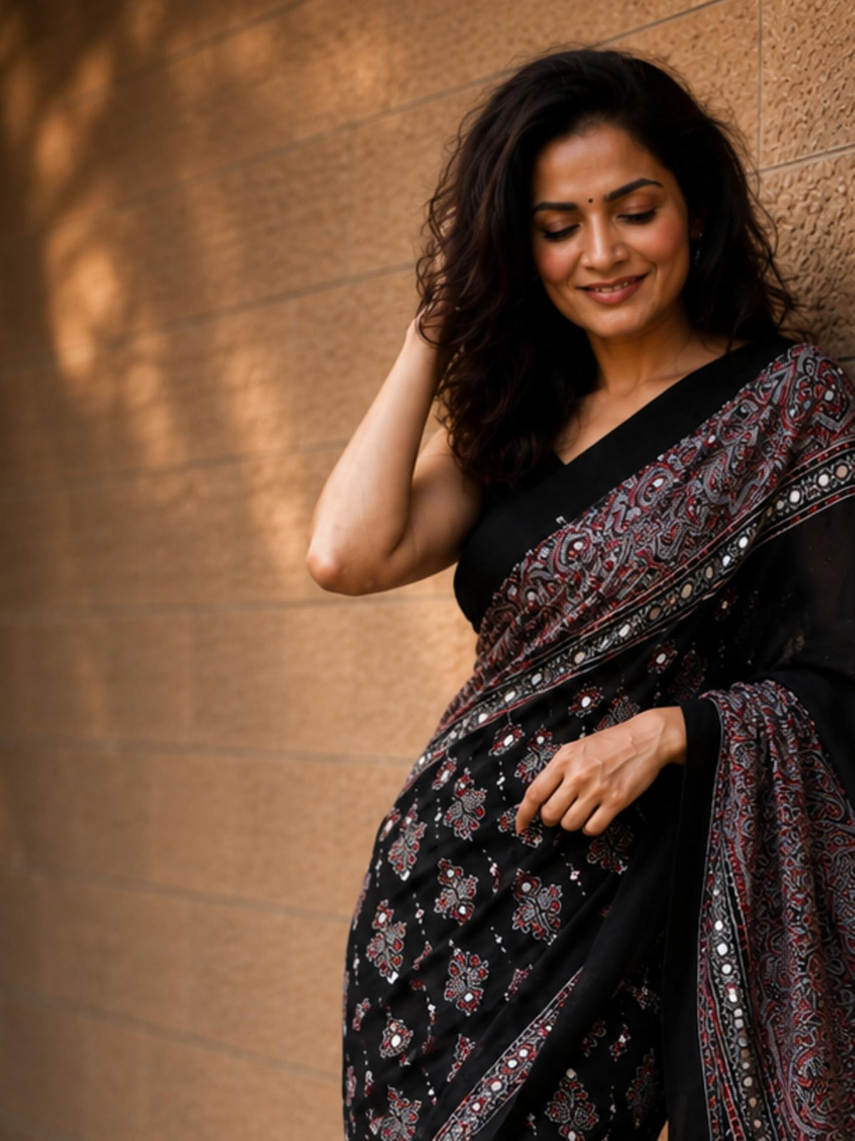 Kryone Collection Ajrakh Modal Silk Saree for Women | Mirror Work Black Saree | Gajji Silk Red Pallu Tassels | Designer Sarees for Women Party | Ajrakh Print Saree | Modal Silk Sarees Original